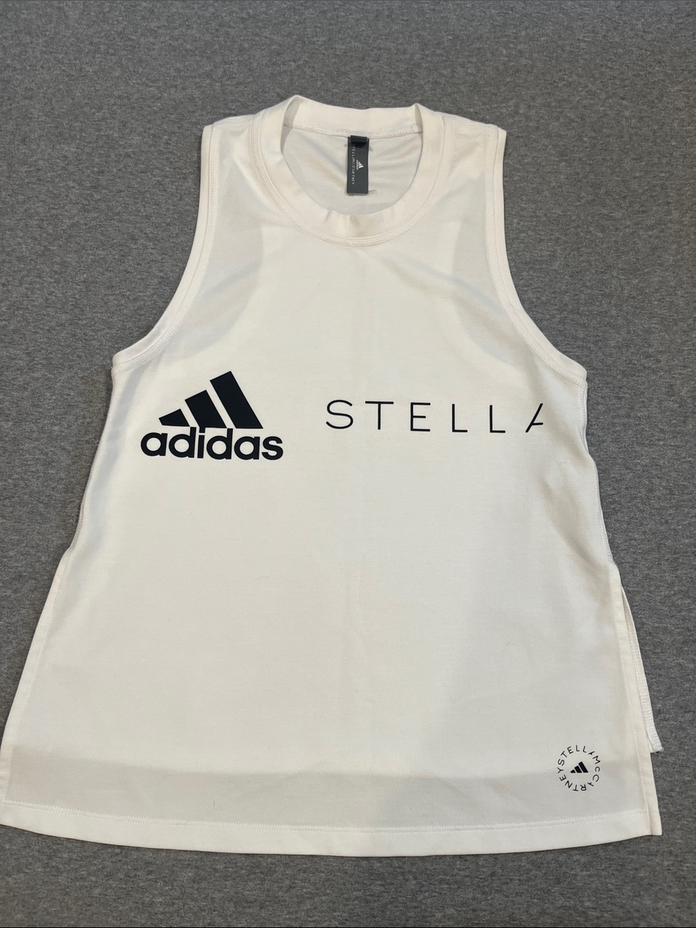 Adidas by Stella McCartney logo tank top. White with black lettering. Size XS.